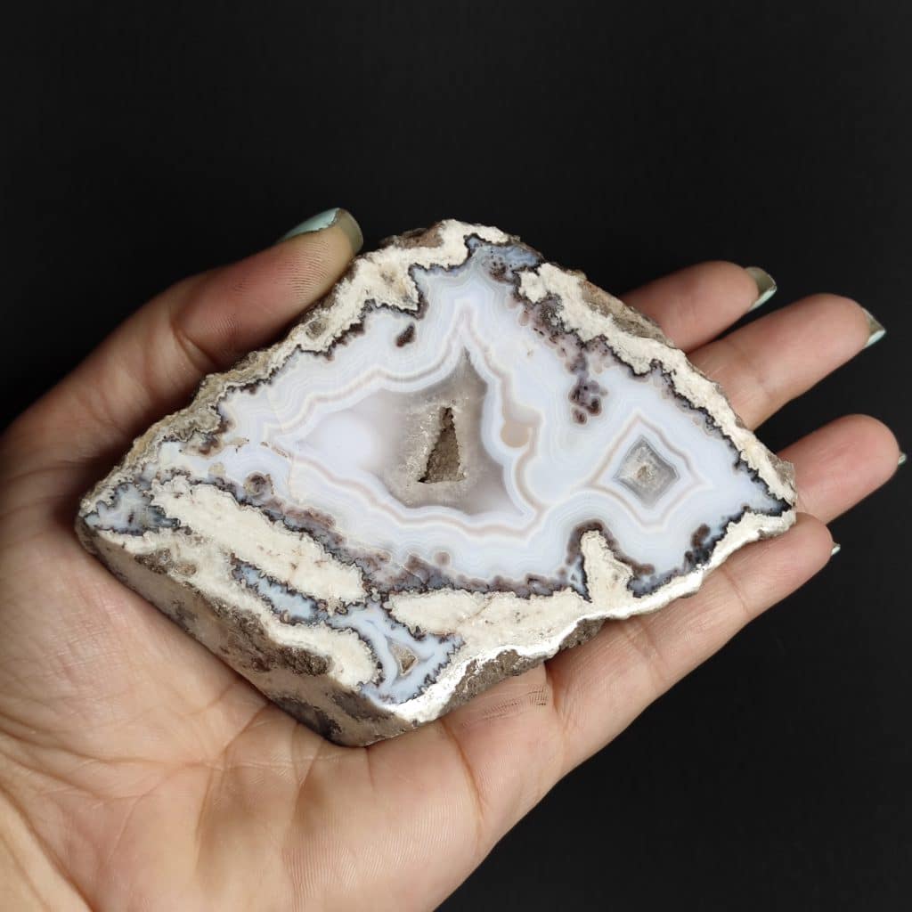 Iranian Snow Solomon Agate is a precious gemstone that has been discovered and mined in Khorasan. This stone weighs approximately 200 grams and measures 12×7×2 centimeters, It was obtained in the year 2022. Its chemical formula is similar to other types of agate, SiO2.H2O.